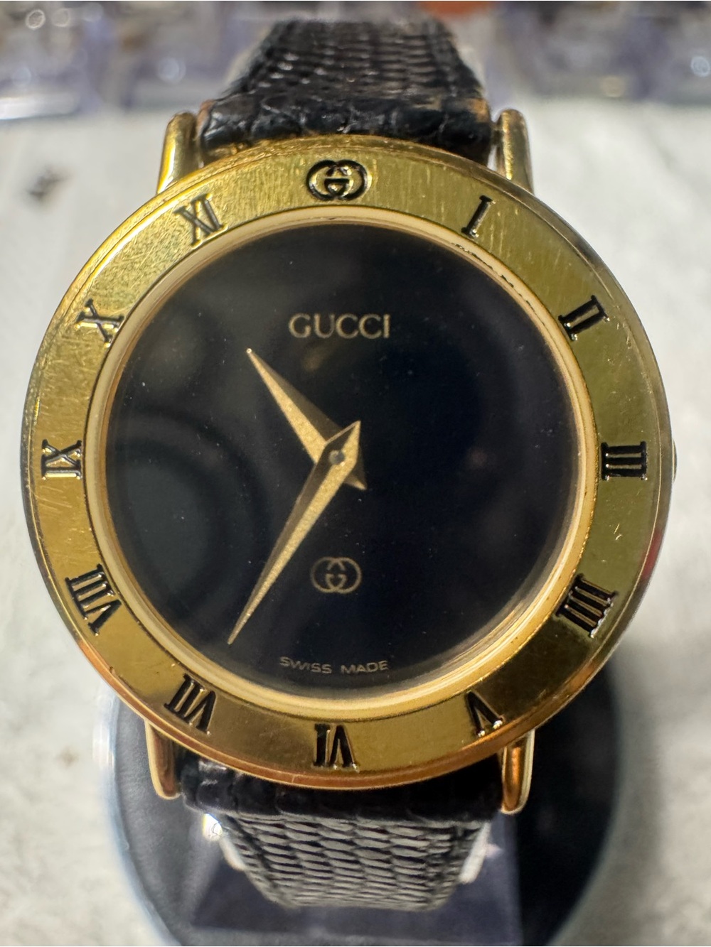 #223 Gucci Black Dial Gold Bezel Leather Strap Watch